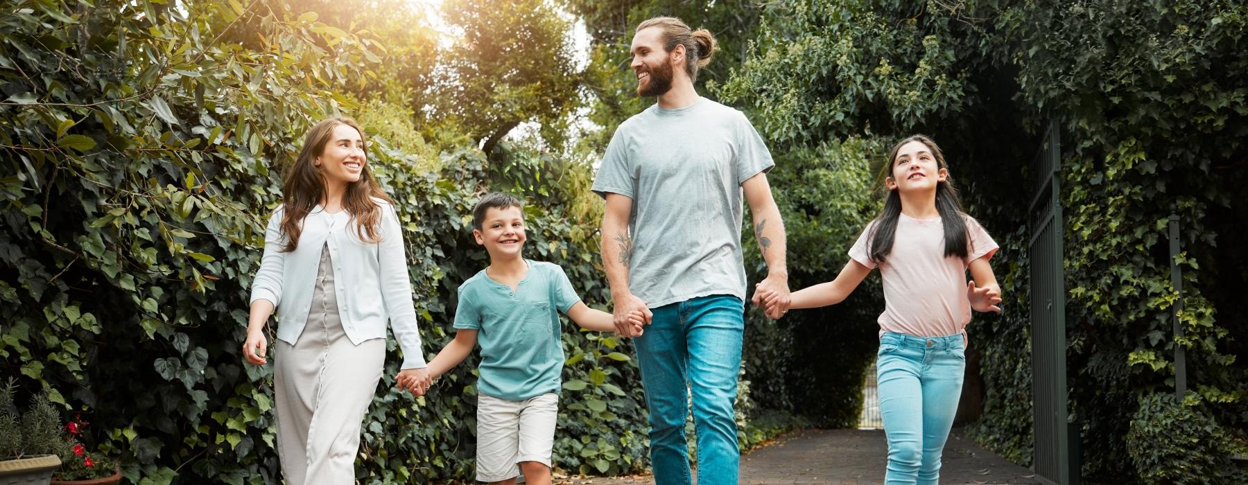 a family walking on a brick path